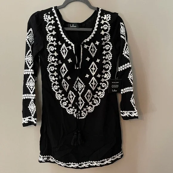 green emerald velvet dress Yumi Black Sequin Embroidered Tunic Dress With Feather Trim Hemline